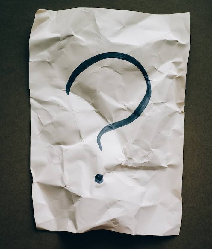 question mark on crumpled paper